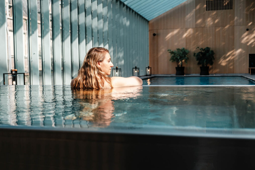 Luxurious spa facilities swimming pool saunas and steam rooms in botanic sanctuary antwerp
